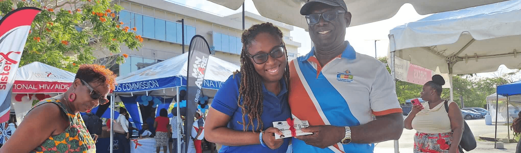 DHAB Treasurer Anderson making a presentation to a young lady